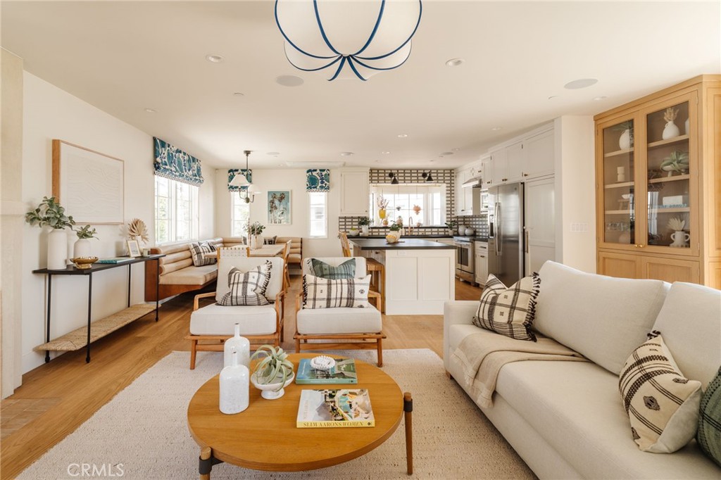429 20th Street Manhattan Beach, CA 90266 - Photo 11 of 57 a living room with furniture kitchen view and a large window