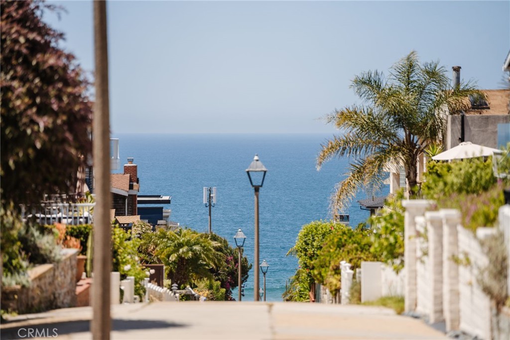 429 20th Street Manhattan Beach, CA 90266 - Photo 3 of 57 a view of a street with flower plants