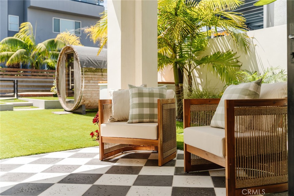 429 20th Street Manhattan Beach, CA 90266 - Photo 33 of 57 a view of a two chairs in the patio