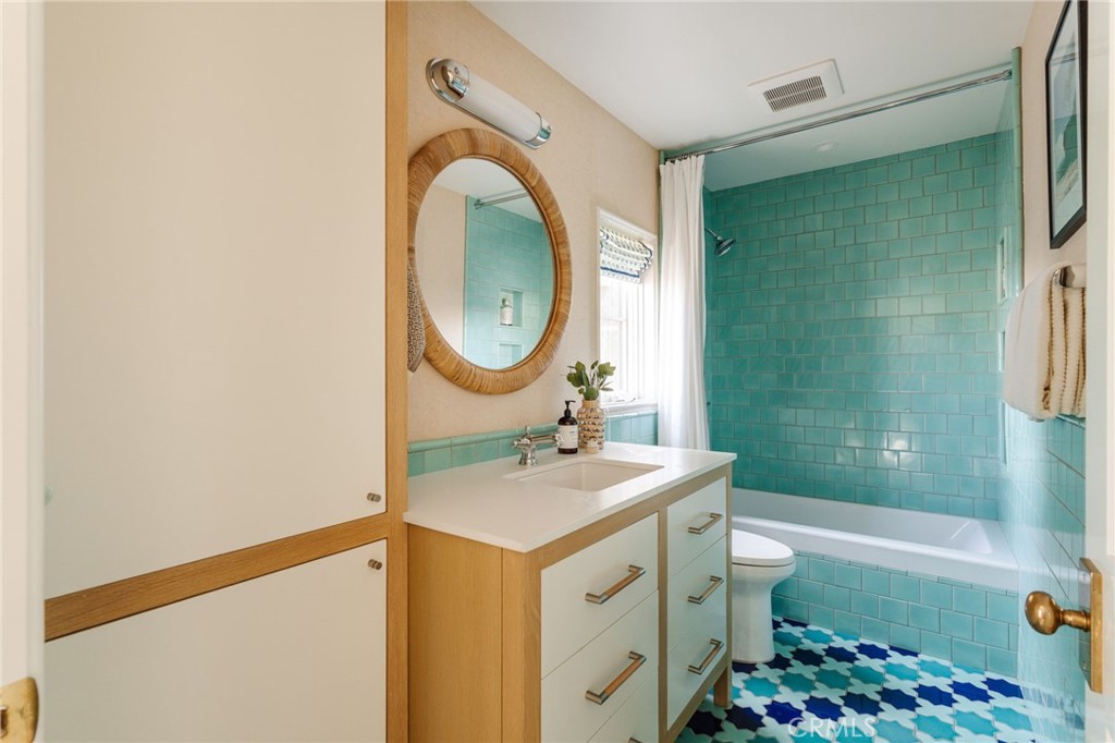 429 20th Street Manhattan Beach, CA 90266 - Photo 45 of 57 a bathroom with a sink toilet and shower