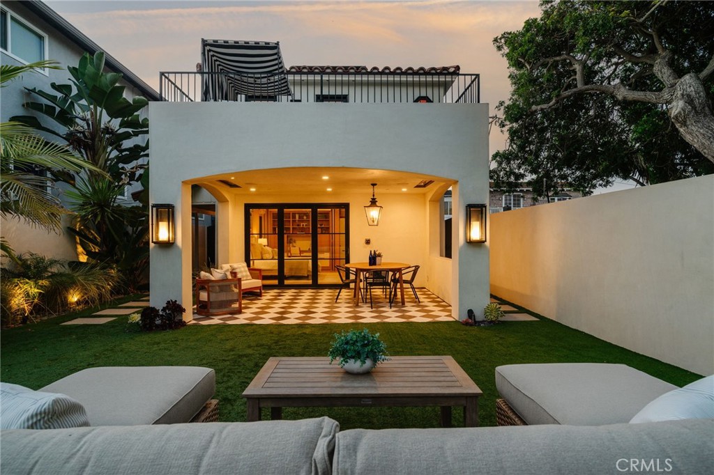 429 20th Street Manhattan Beach, CA 90266 - Photo 56 of 57 a view of house with yard outdoor seating and green space