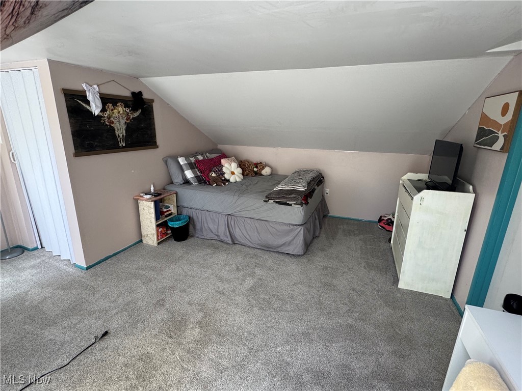 1452 Avalon Road Wooster, OH 44691 - Photo 29 of 31 Bedroom with carpet and vaulted ceiling
