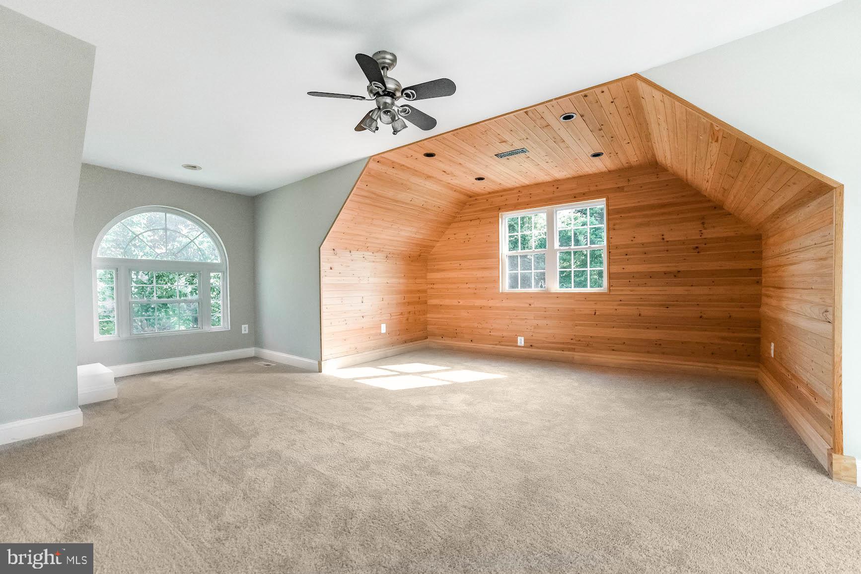 12756 Bullet Bend Road Lusby, MD 20657 - Photo 11 of 56 an empty room with windows