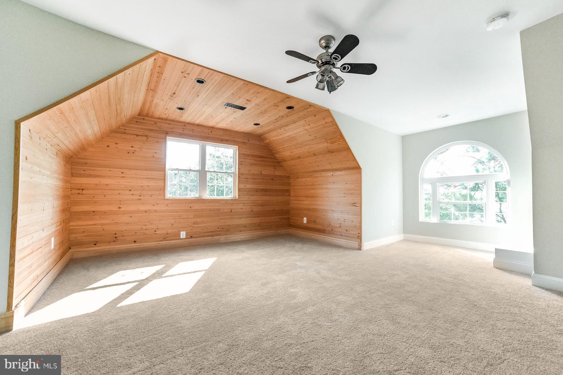 12756 Bullet Bend Road Lusby, MD 20657 - Photo 12 of 56 an empty room with windows