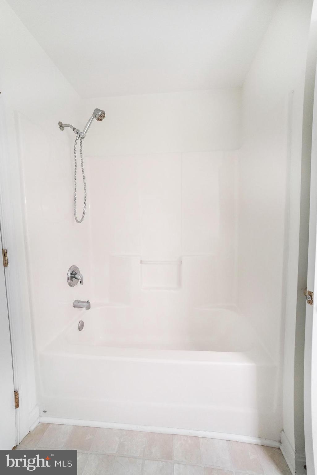 12756 Bullet Bend Road Lusby, MD 20657 - Photo 20 of 56 a bathroom with a shower
