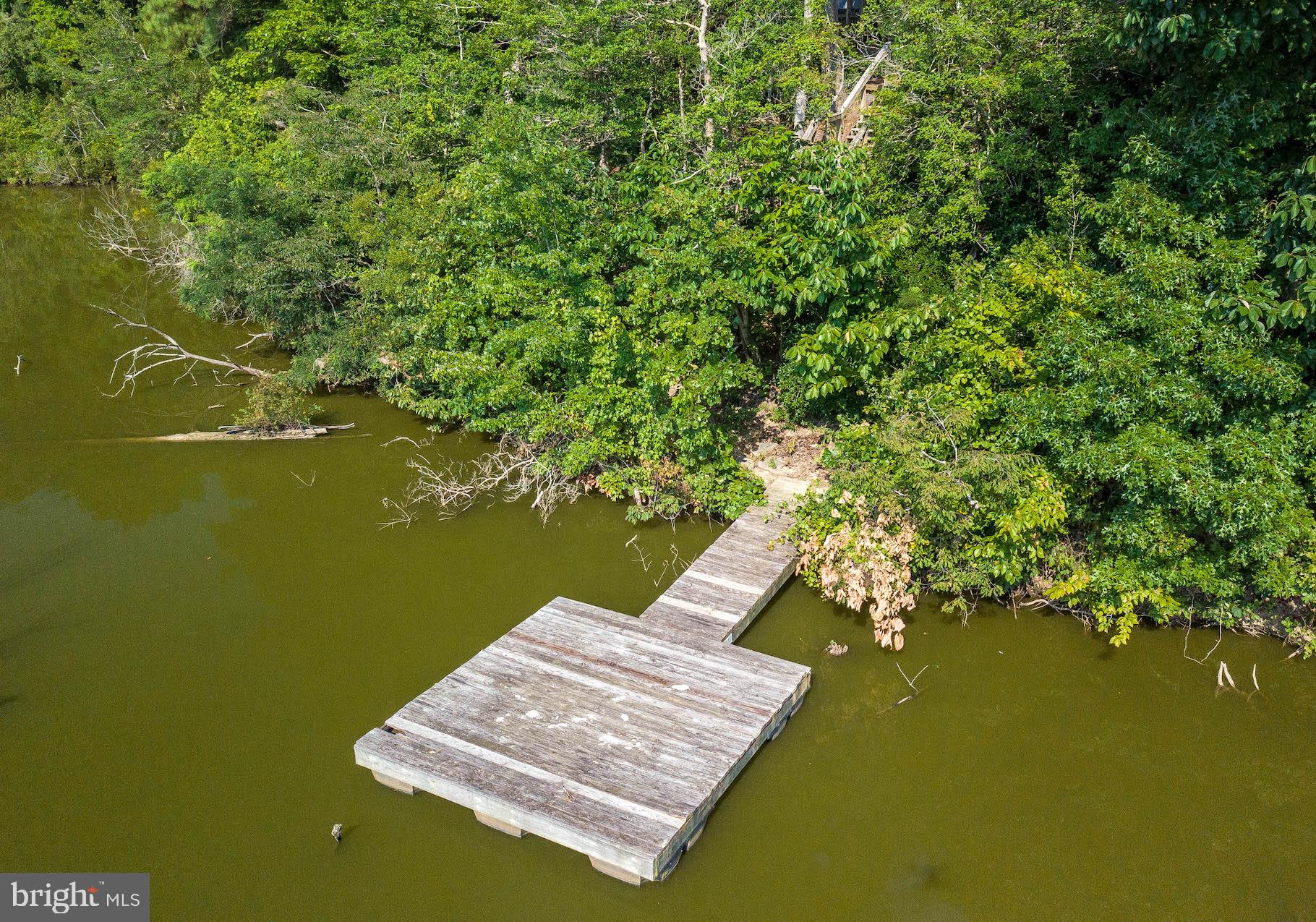 12756 Bullet Bend Road Lusby, MD 20657 - Photo 5 of 56 a view of lake from deck
