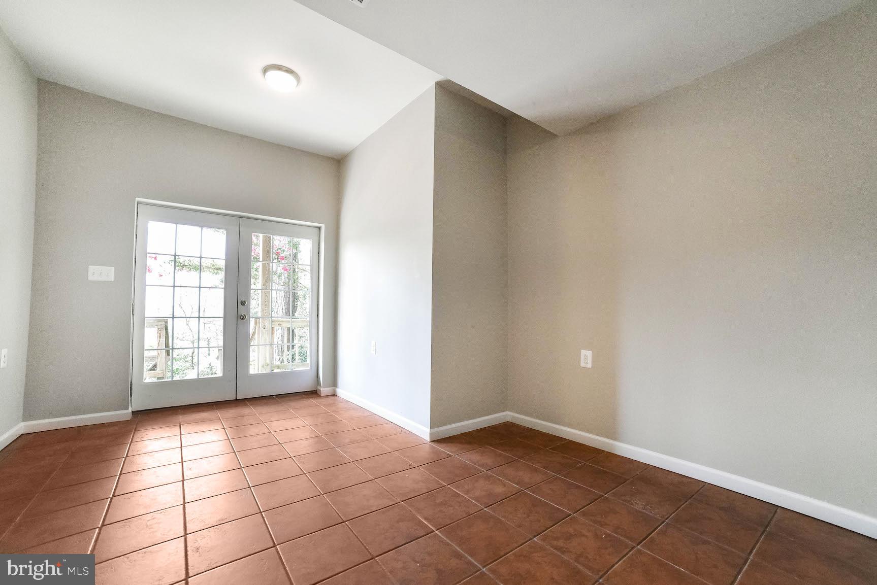 12756 Bullet Bend Road Lusby, MD 20657 - Photo 48 of 56 a view of an empty room with a window