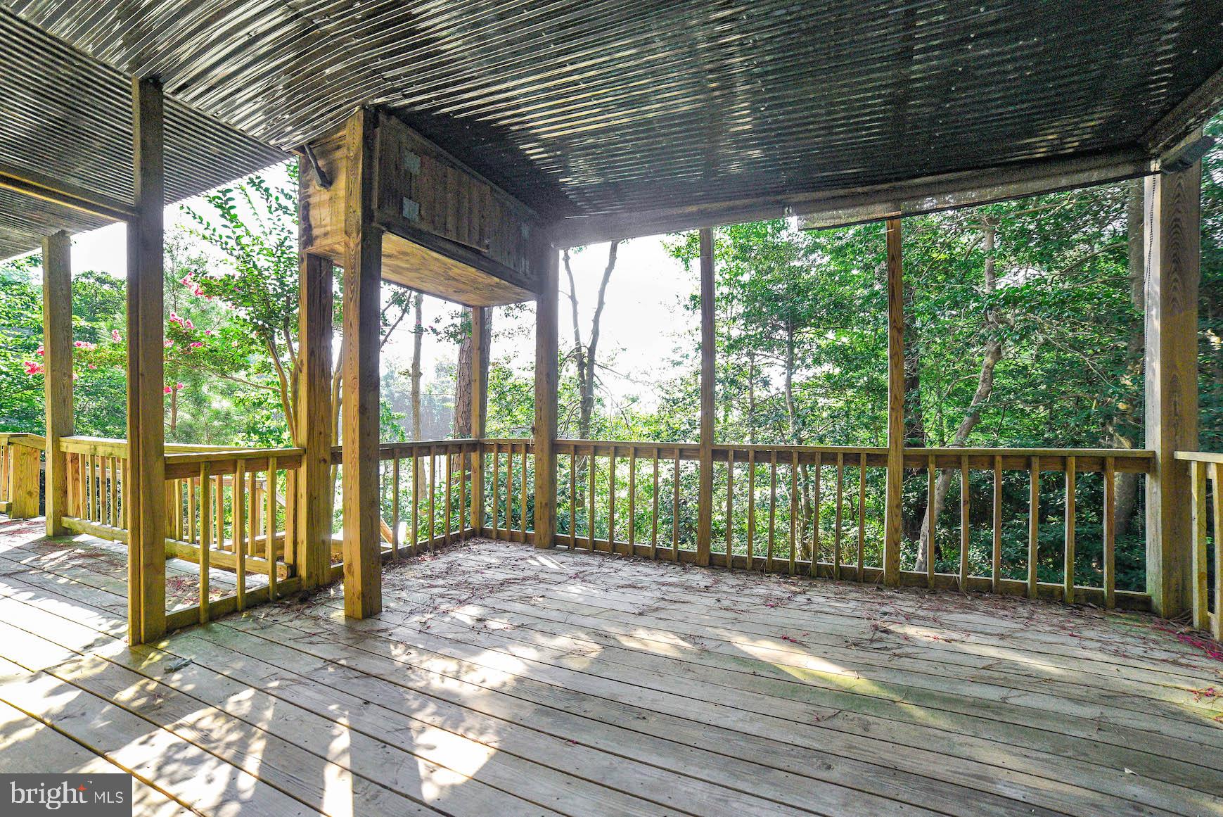 12756 Bullet Bend Road Lusby, MD 20657 - Photo 52 of 56 a view of a room with wooden floor and balcony