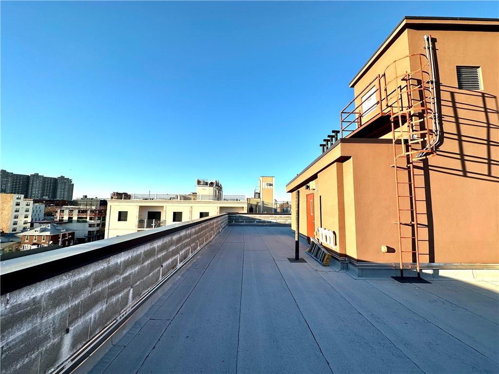 3016 Brighton 5th Street, Unit 1A Brooklyn, NY 11235 - Photo 14 of 15 a view of a balcony with wooden floor
