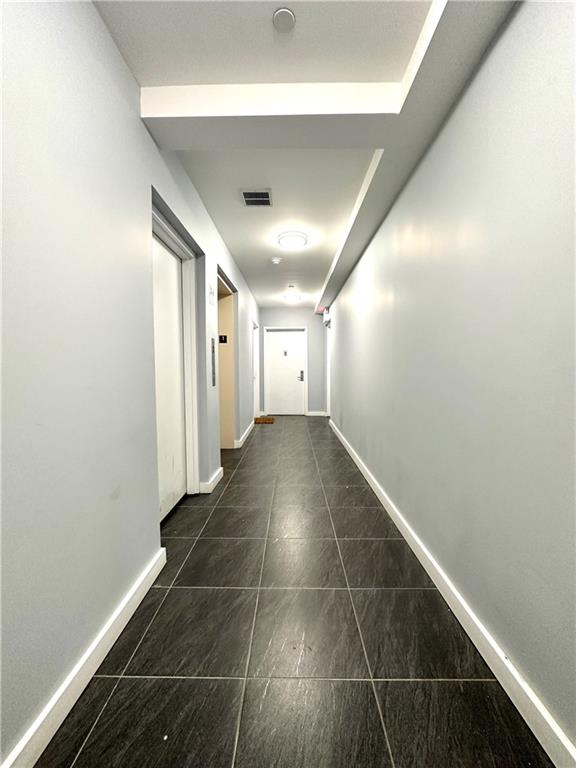 3016 Brighton 5th Street, Unit 1A Brooklyn, NY 11235 - Photo 2 of 15 a view of a hallway with closet