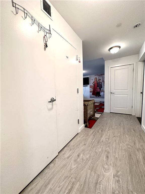 3016 Brighton 5th Street, Unit 1A Brooklyn, NY 11235 - Photo 4 of 15 a view of a room & utility room