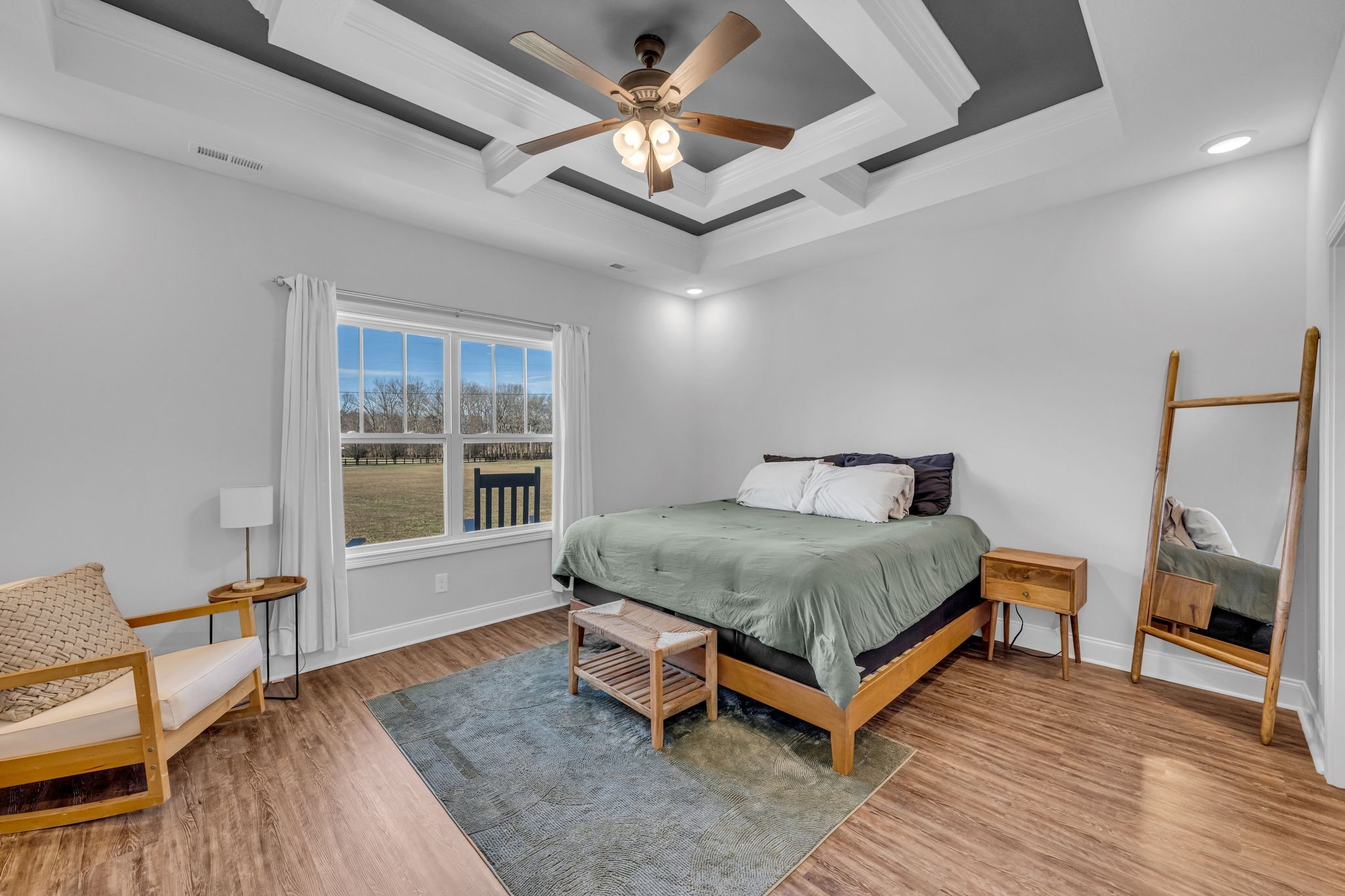 1277 Lecomte Road Dickson, TN 37055 - Photo 12 of 30 a bed sitting in a spacious bedroom next to a window