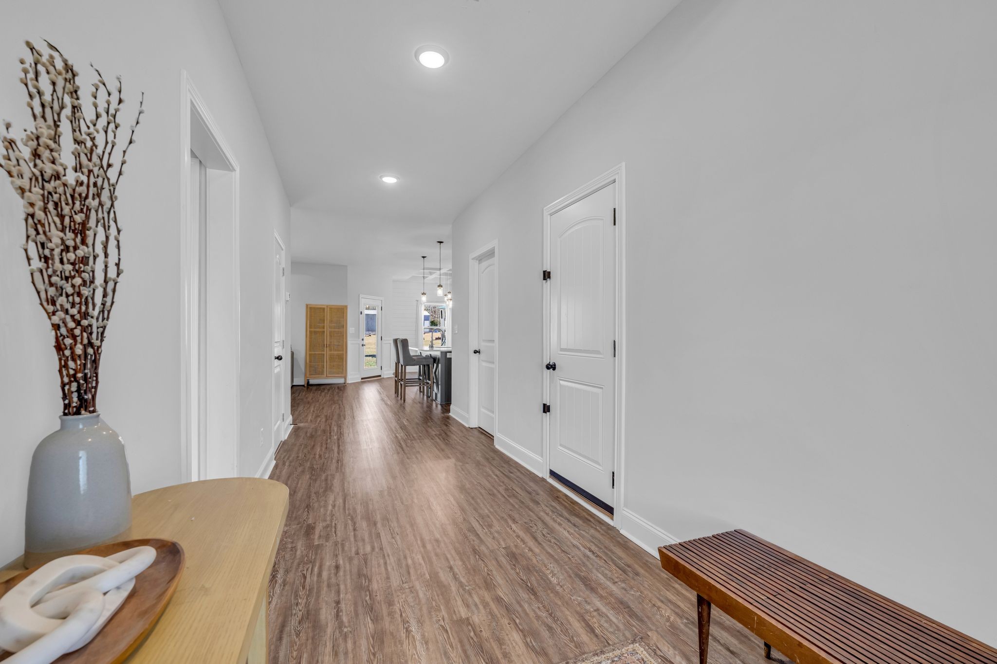 1277 Lecomte Road Dickson, TN 37055 - Photo 3 of 30 a view of a hallway with wooden floor and furniture