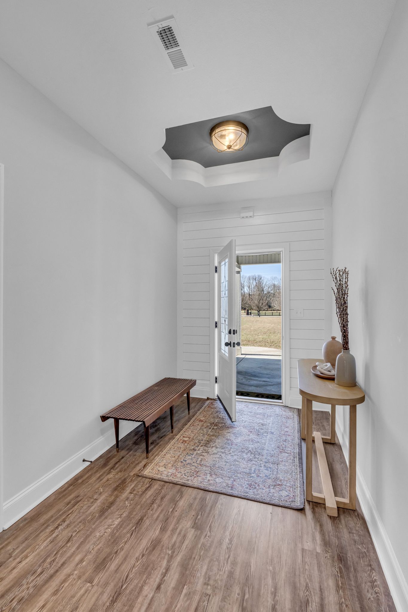 1277 Lecomte Road Dickson, TN 37055 - Photo 4 of 30 a living room with furniture and a wooden floor