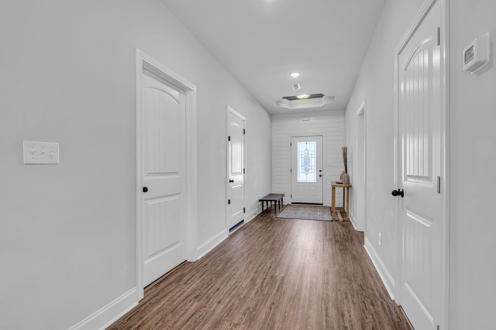 1277 Lecomte Road Dickson, TN 37055 - Photo 5 of 30 a view of a hallway with wooden floor