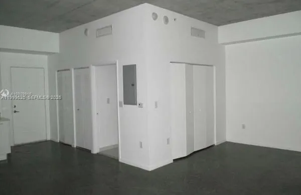 an empty room and a window