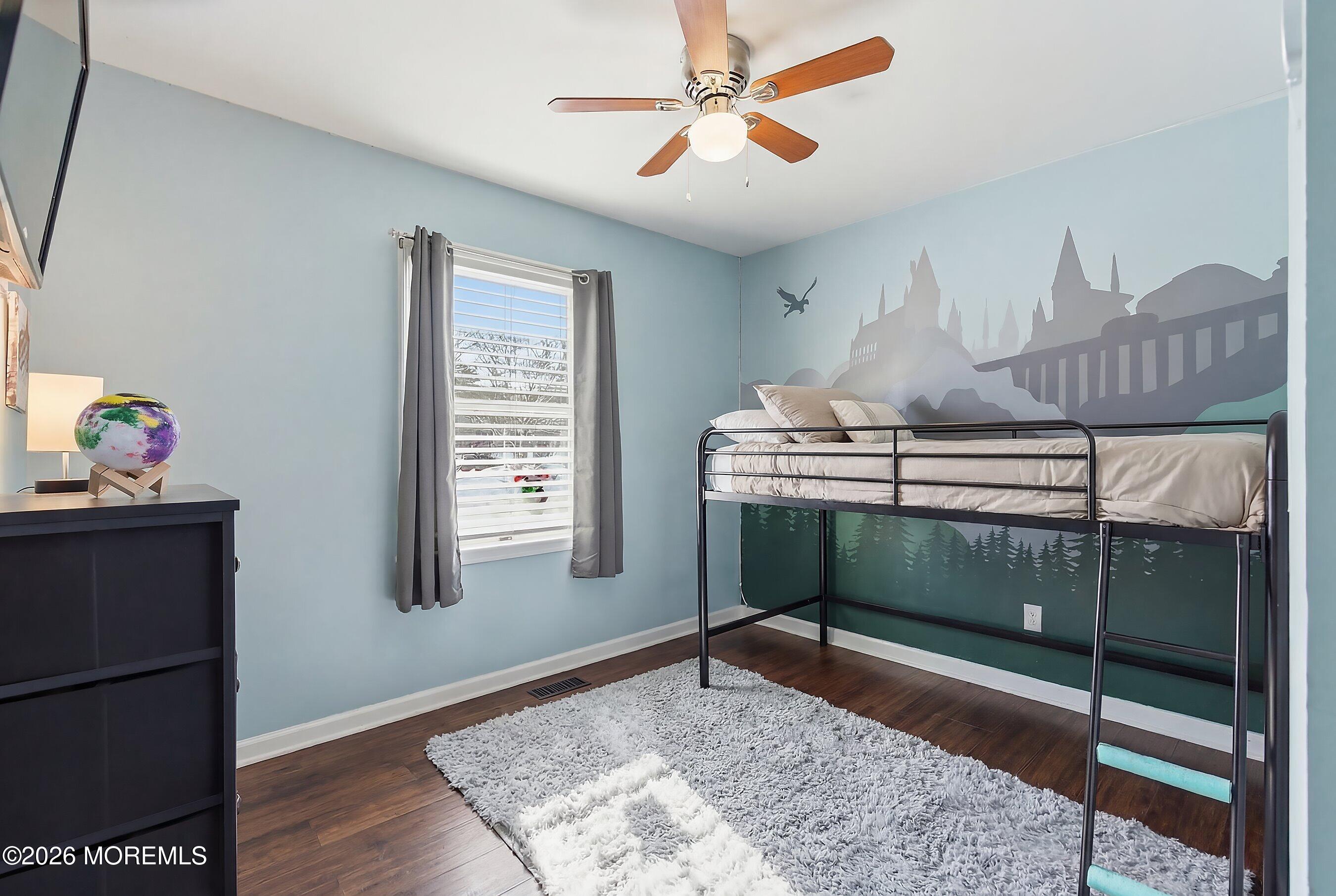 7 Letts Landing Road Waretown, NJ 08758 - Photo 15 of 18 a bedroom with a bed and a window in it