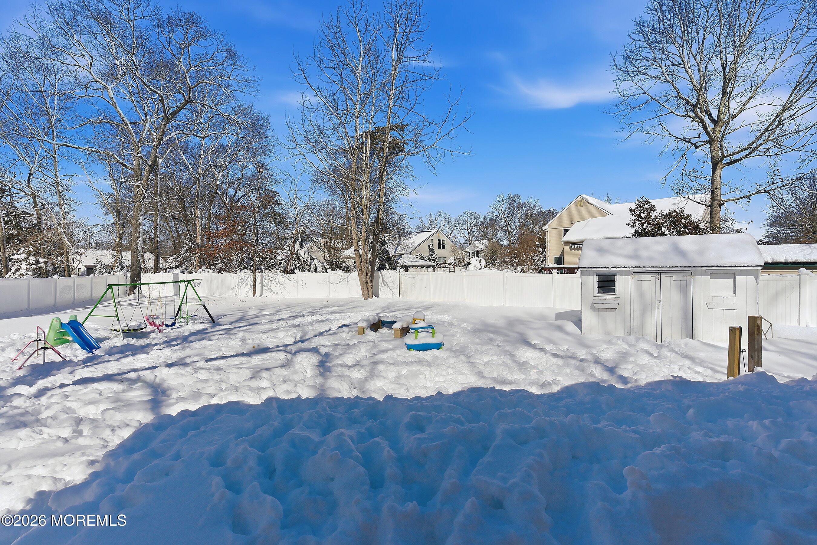 7 Letts Landing Road Waretown, NJ 08758 - Photo 17 of 18 a view of snow on the side of the road