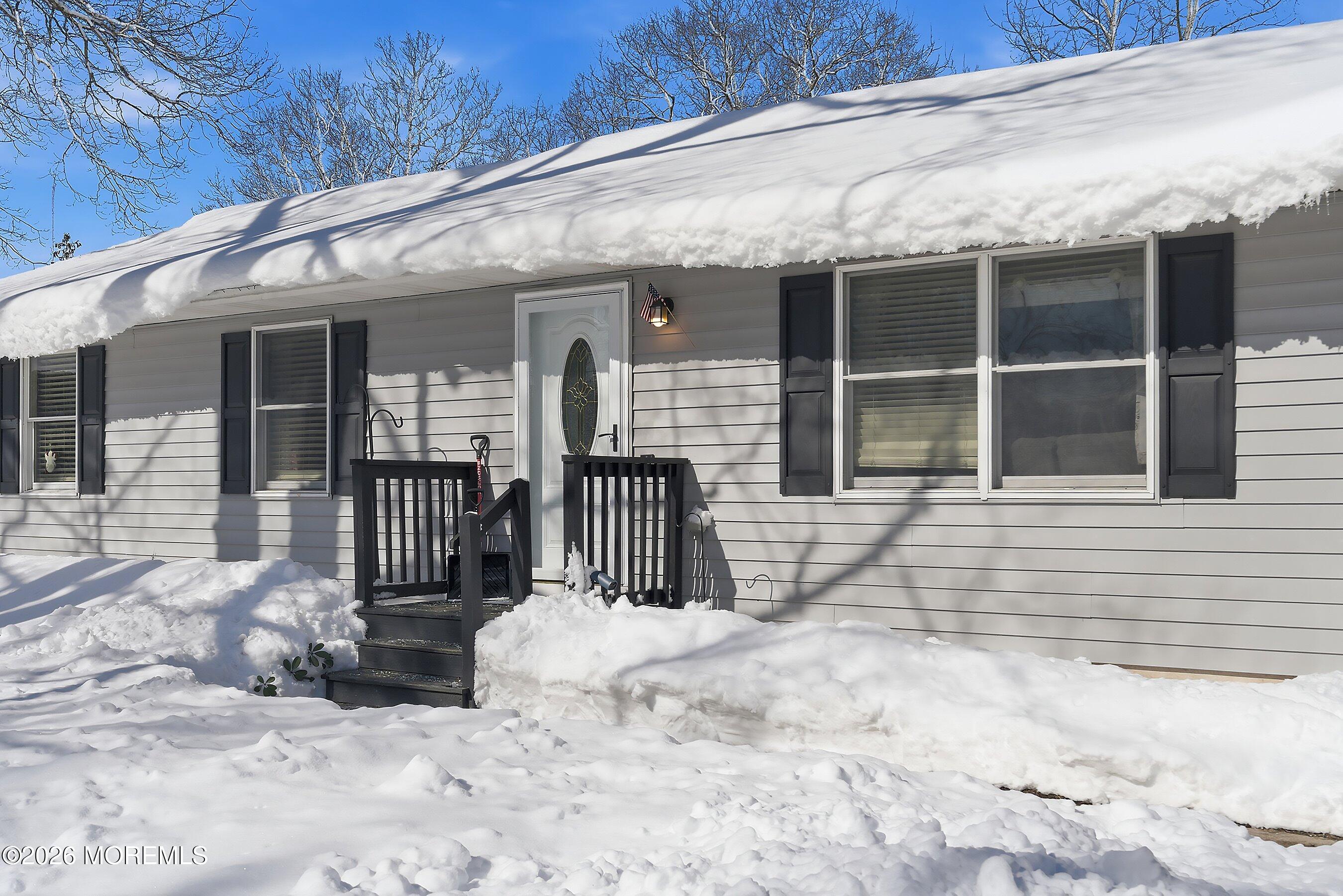 7 Letts Landing Road Waretown, NJ 08758 - Photo 3 of 18 a view of a house with a outdoor space