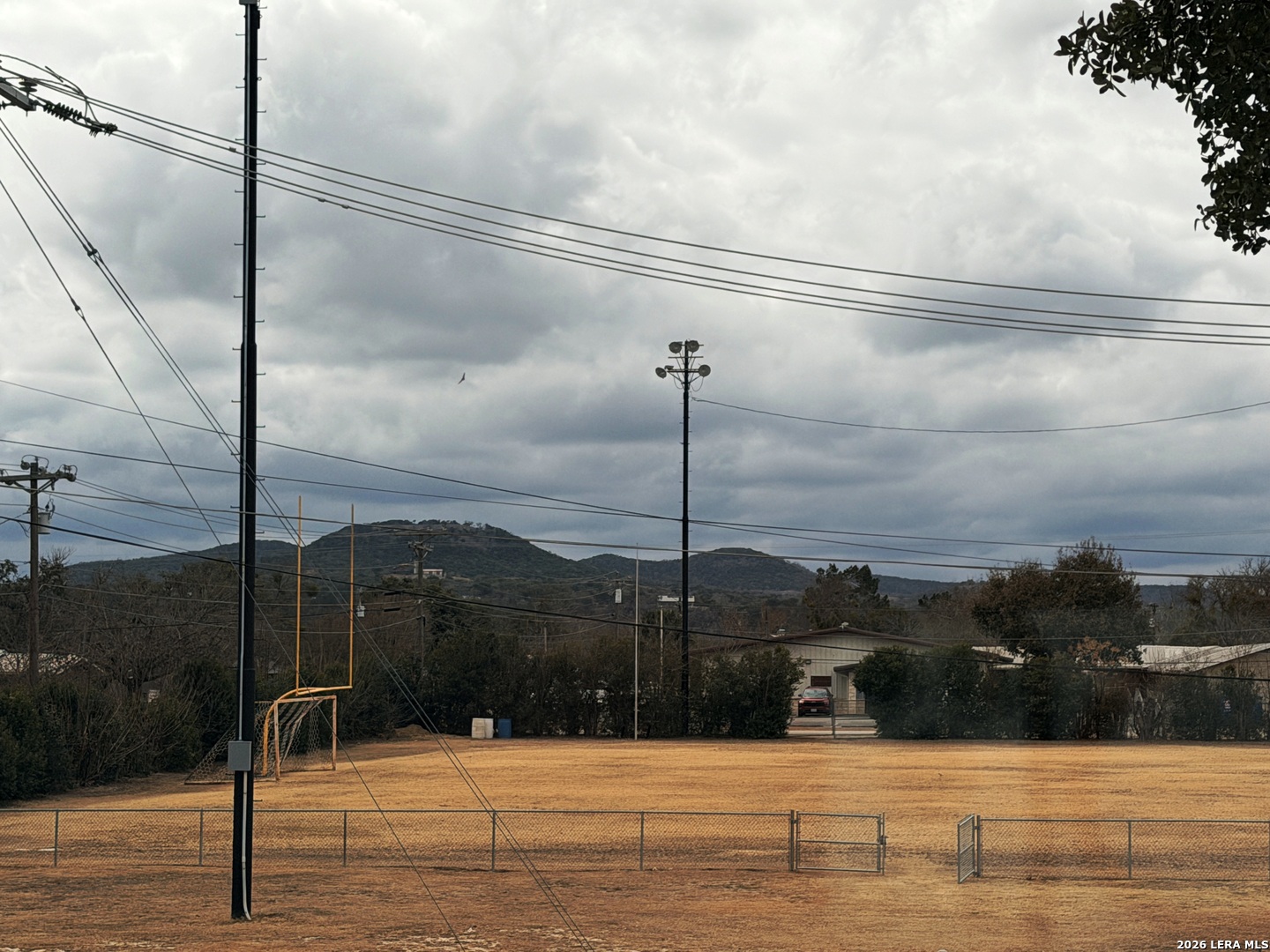 600 A 10th Bandera, TX 78003 - Photo 13 of 13 a view of swimming pool with a view of mountains in the background