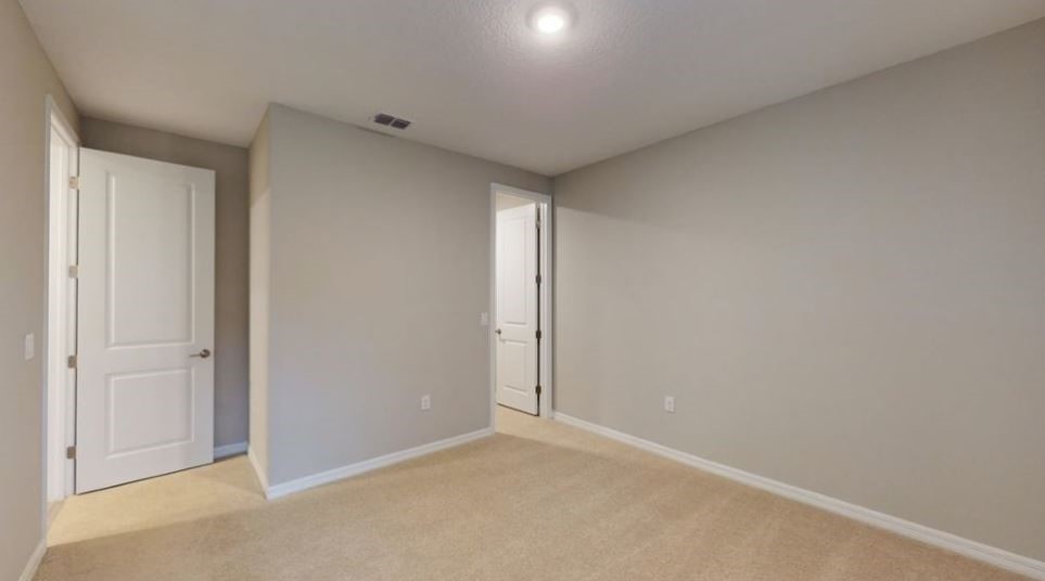 86504 Oar Row North Yulee, FL 32097 - Photo 13 of 28 an empty room with windows