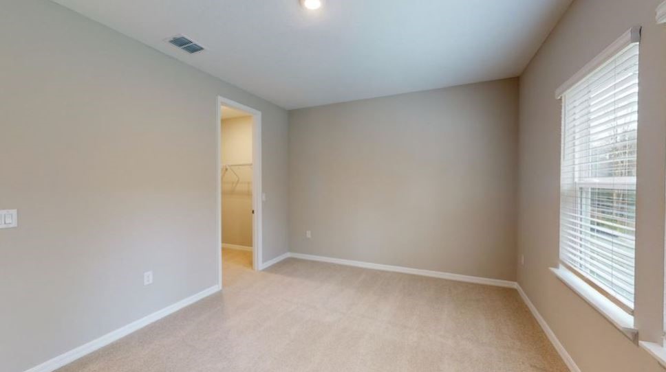 86504 Oar Row North Yulee, FL 32097 - Photo 15 of 28 a view of an empty room with a window