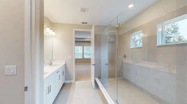 an aerial view of a houses with an outdoor space