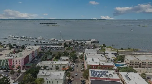 a view of a lake with a city