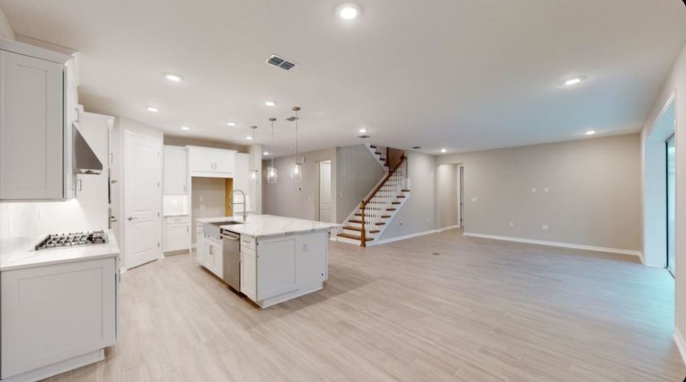 86504 Oar Row North Yulee, FL 32097 - Photo 10 of 28 a living room with furniture and a wooden floor