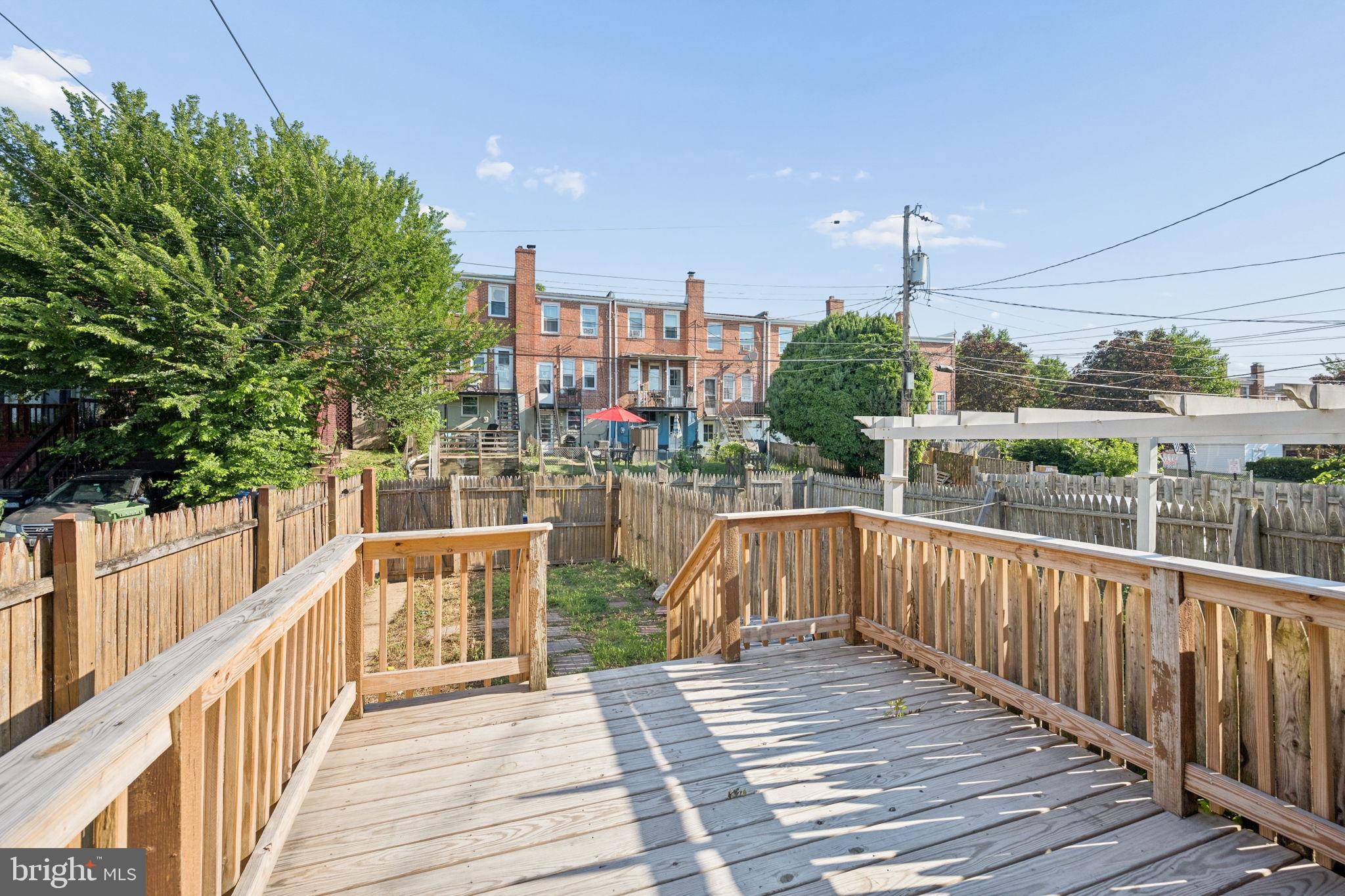 3548 Benzinger Road Baltimore, MD 21229 - Photo 39 of 40 a view of a balcony with wooden floor