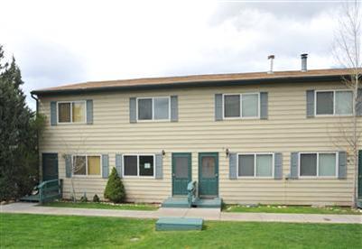 85 Chambers Avenue, Unit 5 Eagle, CO 81631 - Photo 1 of 14 a view of a house with a yard