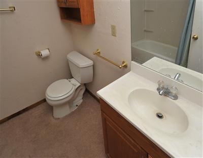 85 Chambers Avenue, Unit 5 Eagle, CO 81631 - Photo 12 of 14 a bathroom with a sink and a mirror