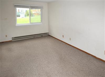 85 Chambers Avenue, Unit 5 Eagle, CO 81631 - Photo 2 of 14 an empty room with a window