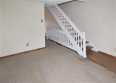 85 Chambers Avenue, Unit 5 Eagle, CO 81631 - Photo 3 of 14 a view of a hallway with staircase