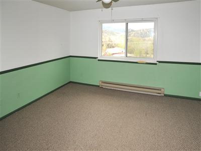 85 Chambers Avenue, Unit 5 Eagle, CO 81631 - Photo 7 of 14 an empty room with a window and a fan