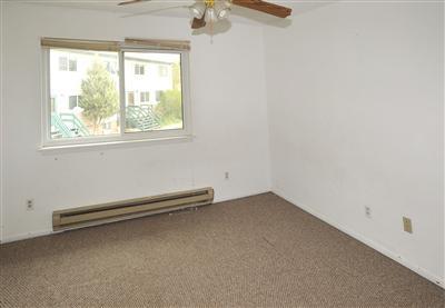 85 Chambers Avenue, Unit 5 Eagle, CO 81631 - Photo 9 of 14 an empty room with a window