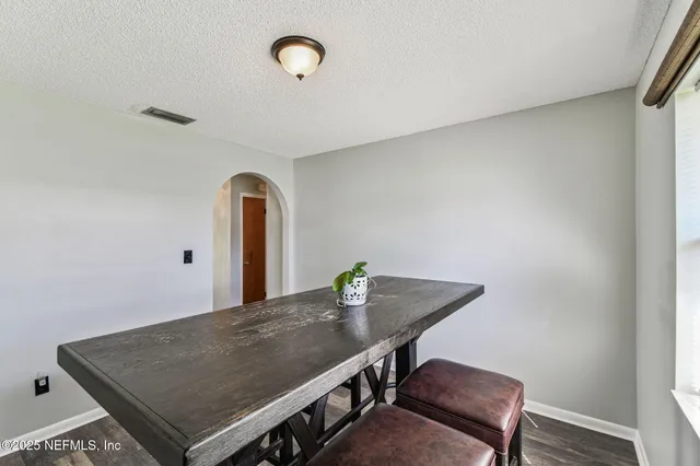 a kitchen with a stove and a microwave