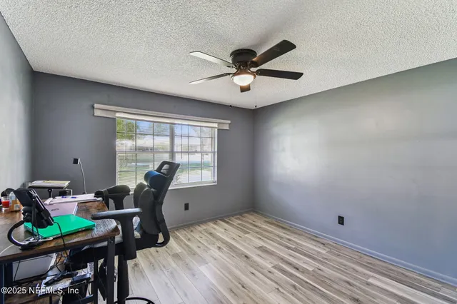 a backyard of a house with a garden