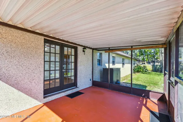 a front view of house with yard and outdoor seating