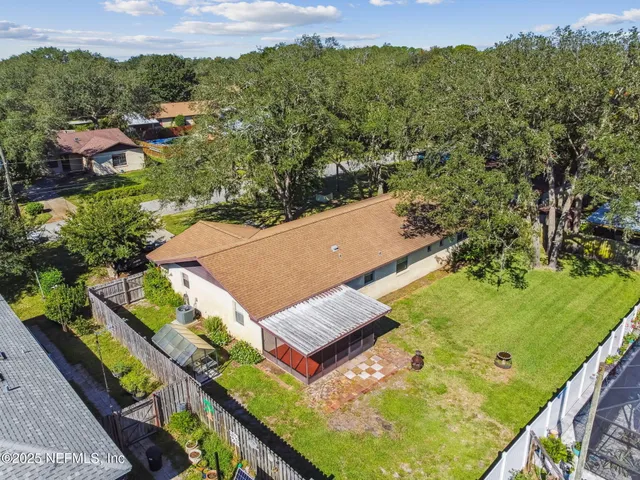 a view of a backyard with plants