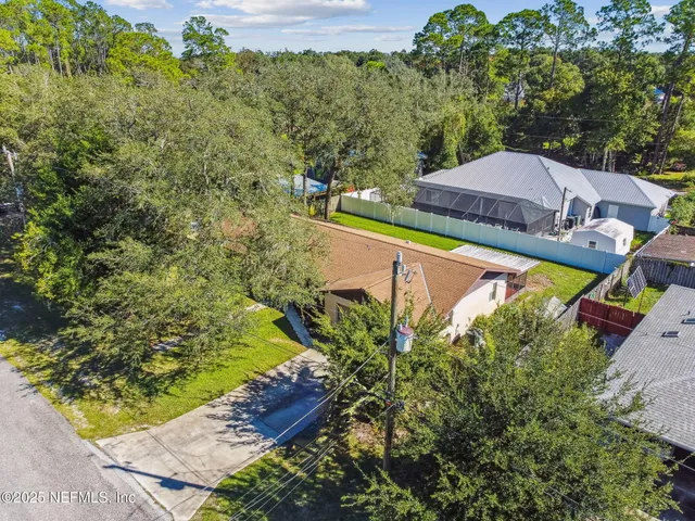 a view of a swimming pool with a garden