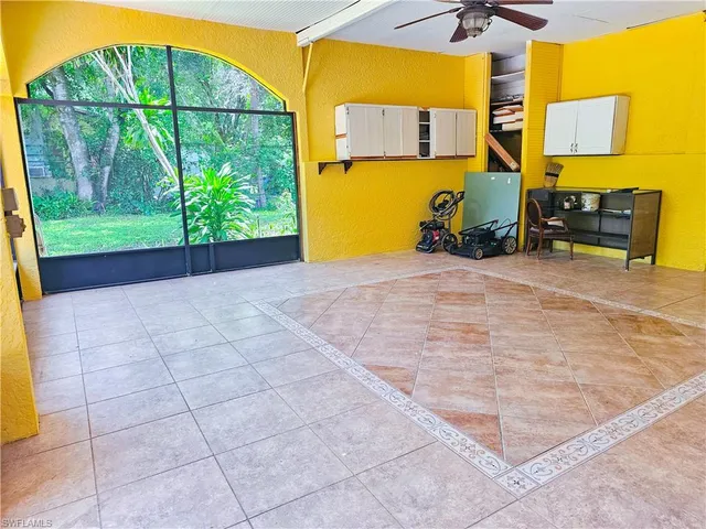 a view of a backyard of the house