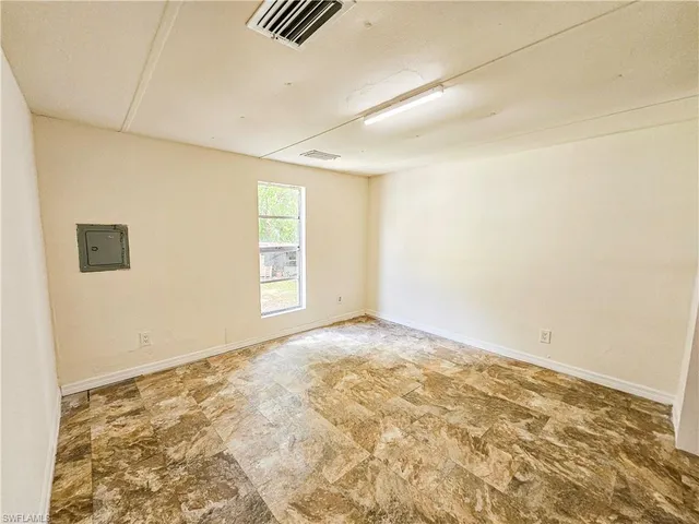 a bathroom with a toilet and a bathtub