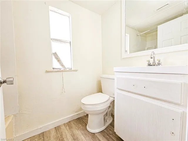 a view of a kitchen with a sink