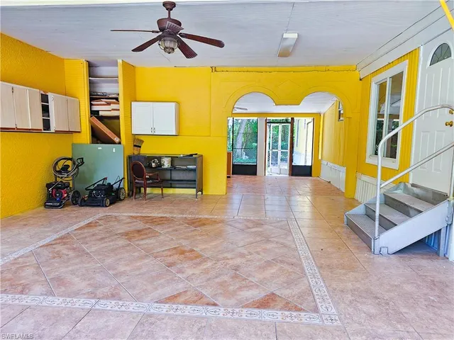 a large white room with a large window