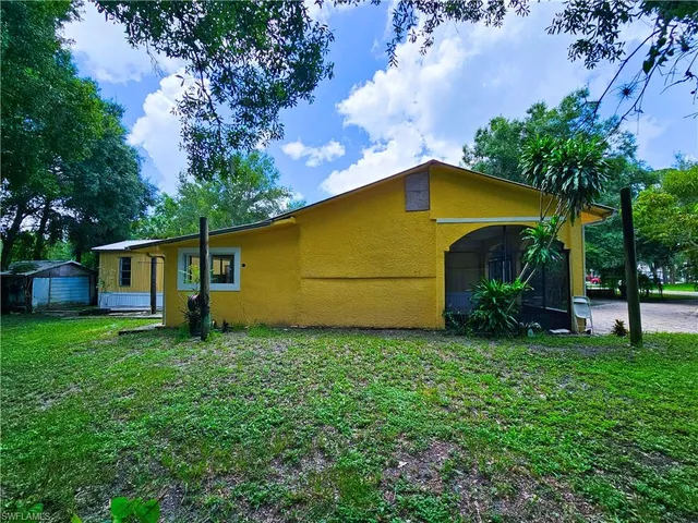 a view of a backyard with a garden