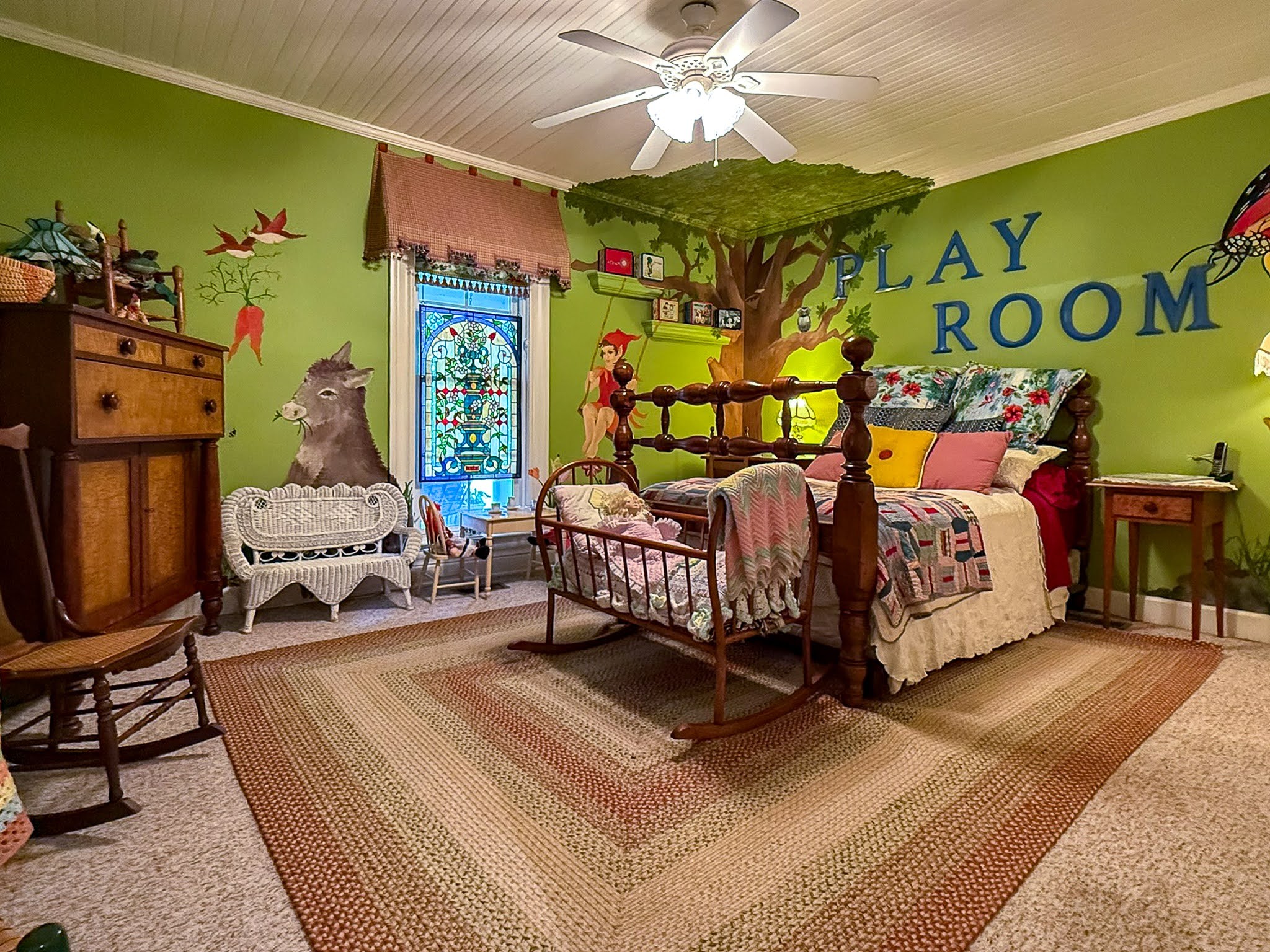 4929 Snow Creek Road Santa Fe, TN 38482 - Photo 14 of 59 a bedroom with a bed and a chandelier