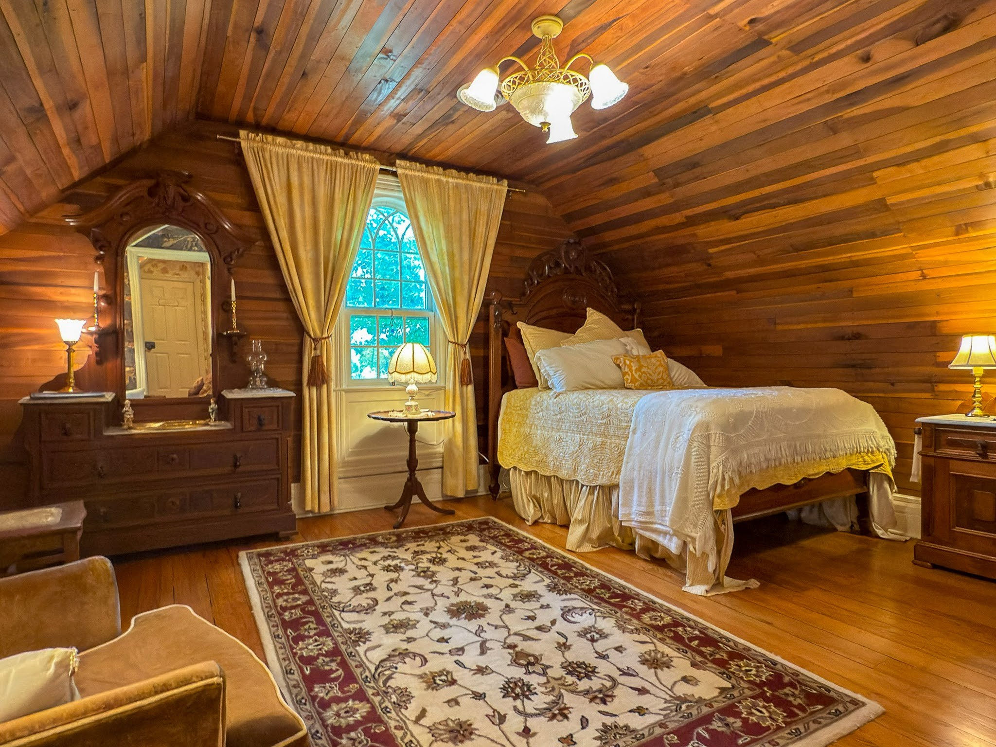 4929 Snow Creek Road Santa Fe, TN 38482 - Photo 20 of 59 a bedroom with a bed and wooden floor