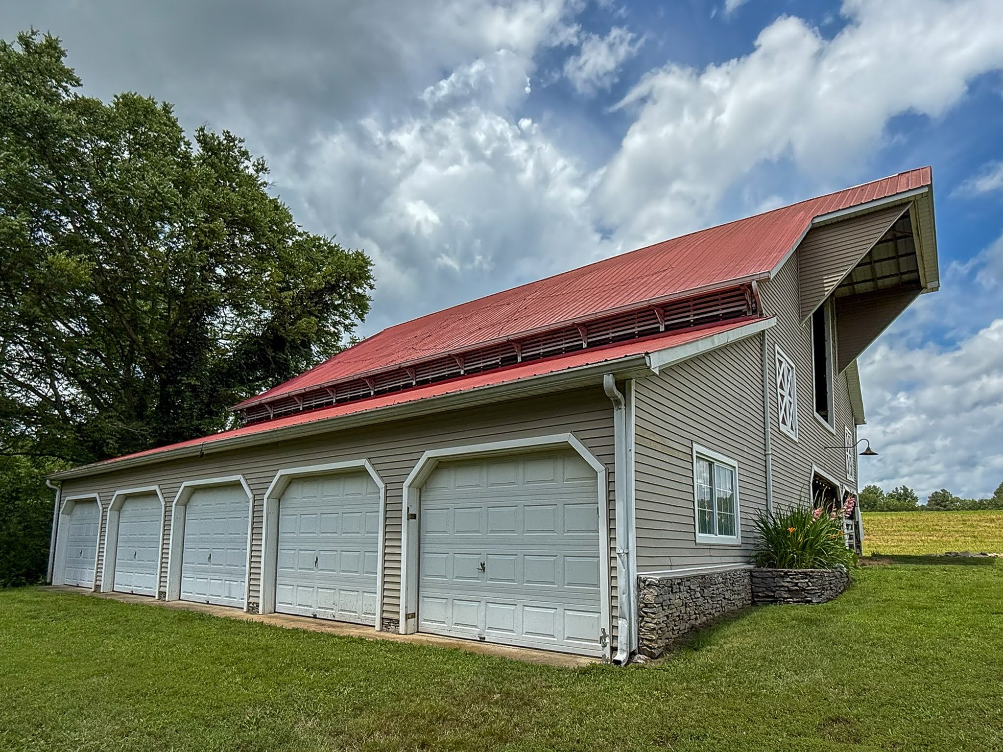 4929 Snow Creek Road Santa Fe, TN 38482 - Photo 36 of 59 a front view of a house with a garden