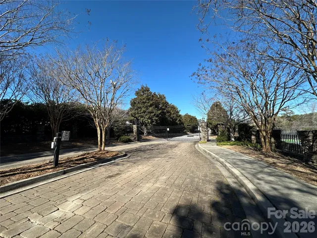 a view of road with a building in the background